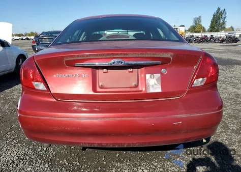 2000 Ford Taurus Ses z USA, uszkodzony, nr VIN 1FAFP5527YG150919